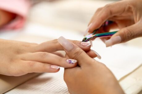 How do I become a nail technician?